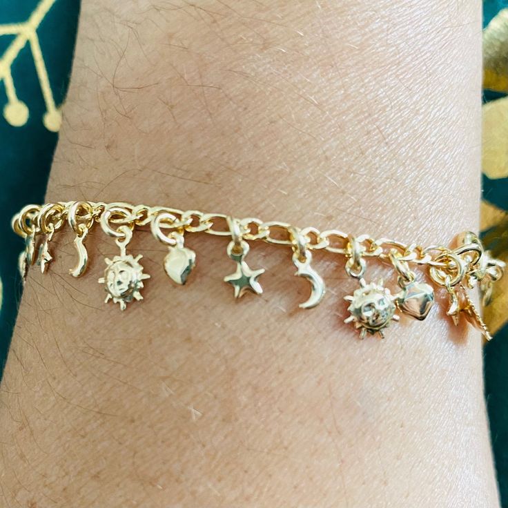 If you want to be connected with the energy of nature and feel part of it, our celestial bracelet is ideal for you, with its beautiful charms of the moon, the sun, and the stars make it a perfect gift for yourself or your loved one. We have it available in two sizes, and we also have the anklets that I will leave the link below. -Bracelet Length: 7.5 inches -Bracelet Length: 8.5 inches -Bracelet Width: 2.5mm -Perfect for all time. -High-quality anklet!  -Related Items: https://www.etsy.com/listi Adjustable Celestial Bracelets With Star Charm, Adjustable Gold Celestial Charm Bracelet, Adjustable Celestial Bracelets With Sun And Moon Design, Adjustable Celestial Sun And Moon Bracelets, Adjustable Sun And Moon Celestial Bracelets, Bohemian Adjustable Bracelet With Star Charm, Adjustable Star-shaped Celestial Bracelets, Adjustable Celestial Star Bracelet, Celestial Adjustable Charm Bracelet Gift