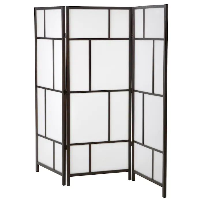 a black and white room divider with four panels