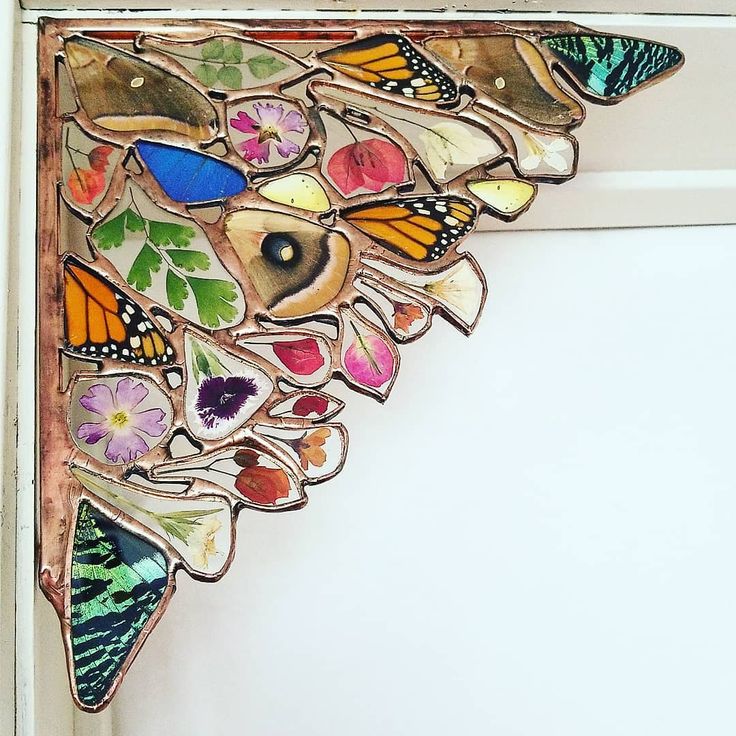 a close up of a butterfly decoration on a door