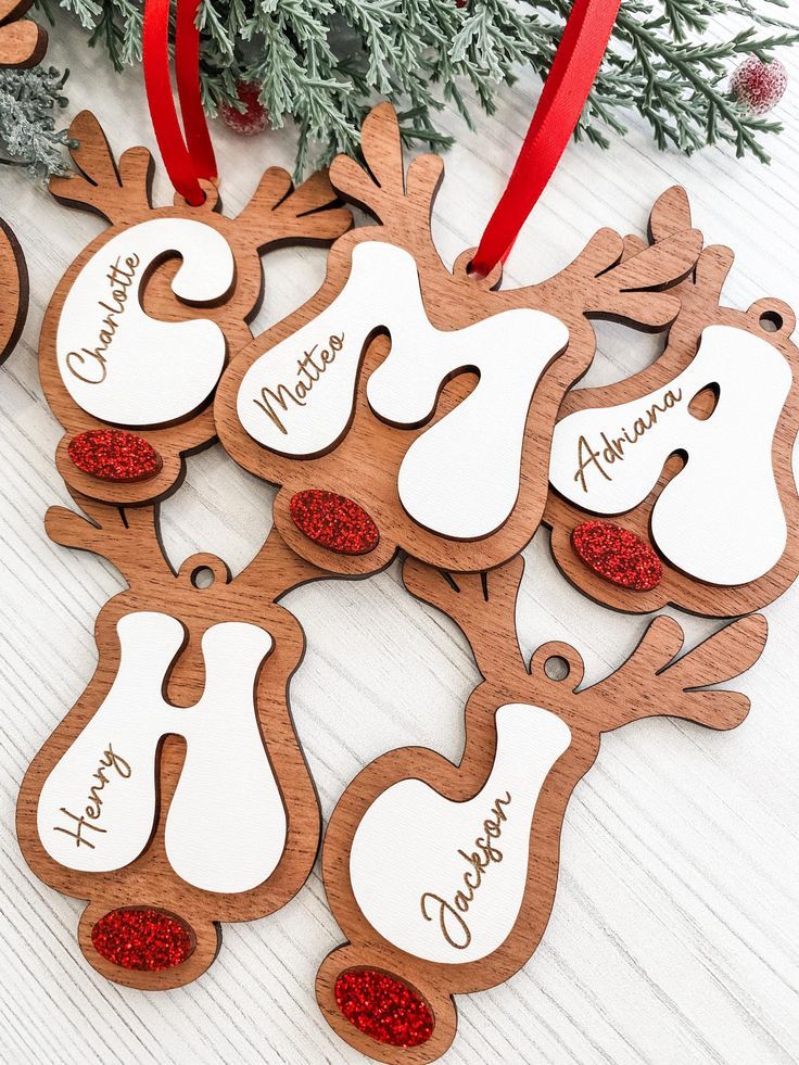 personalized wooden christmas ornament with red glitters on the top and bottom