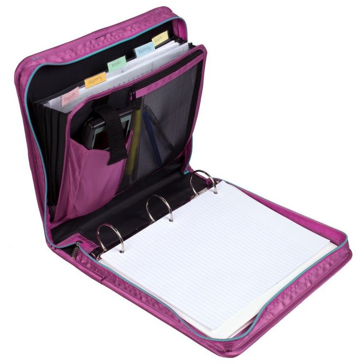 an open purple case with notebooks and binders in it