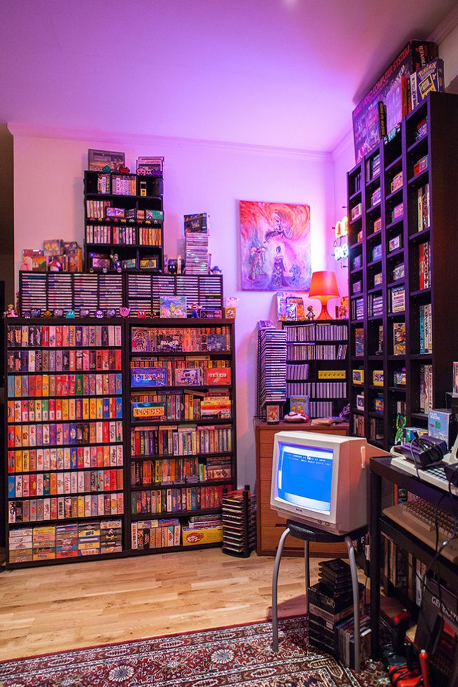 a room filled with lots of books and video games