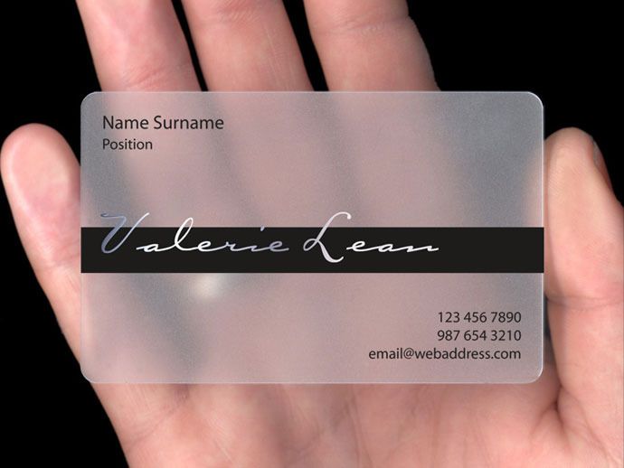 a hand holding a business card with the name valerie jean on it in front of a black background