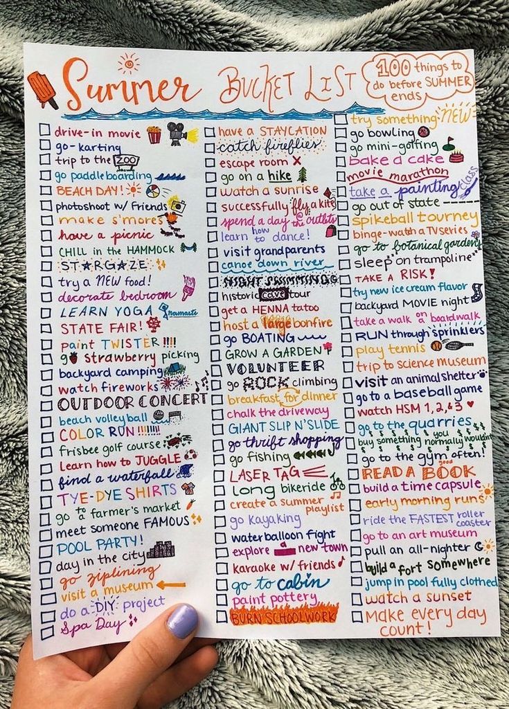 someone is holding up a printable summer bucket list