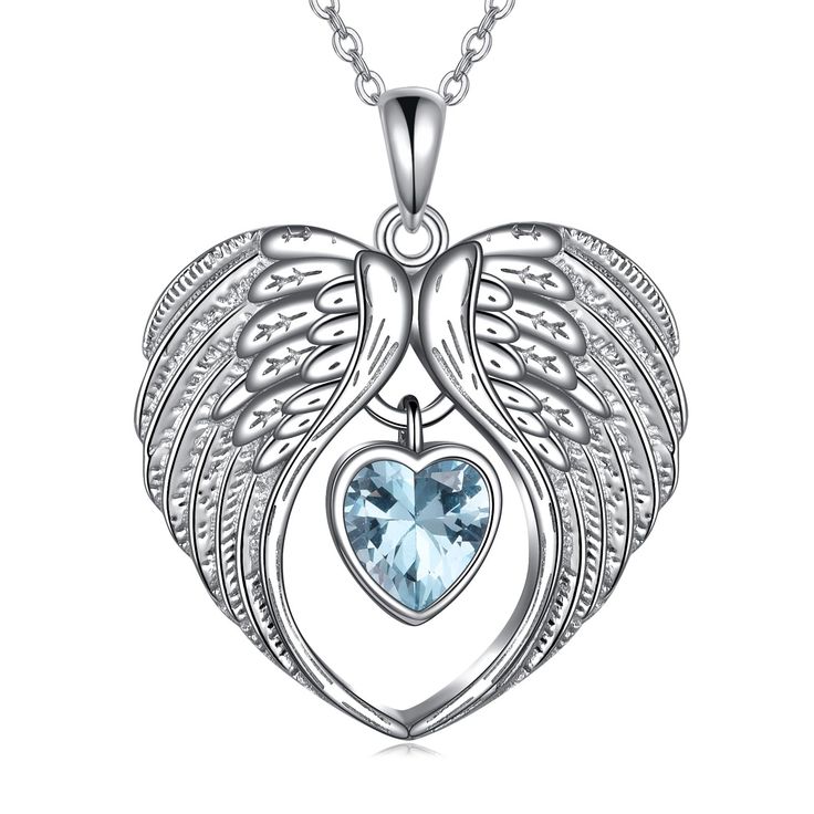 an angel heart pendant with wings and a blue topazte stone in the center