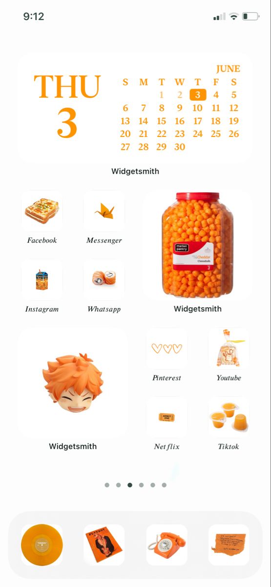 an orange and white calendar with food items on it