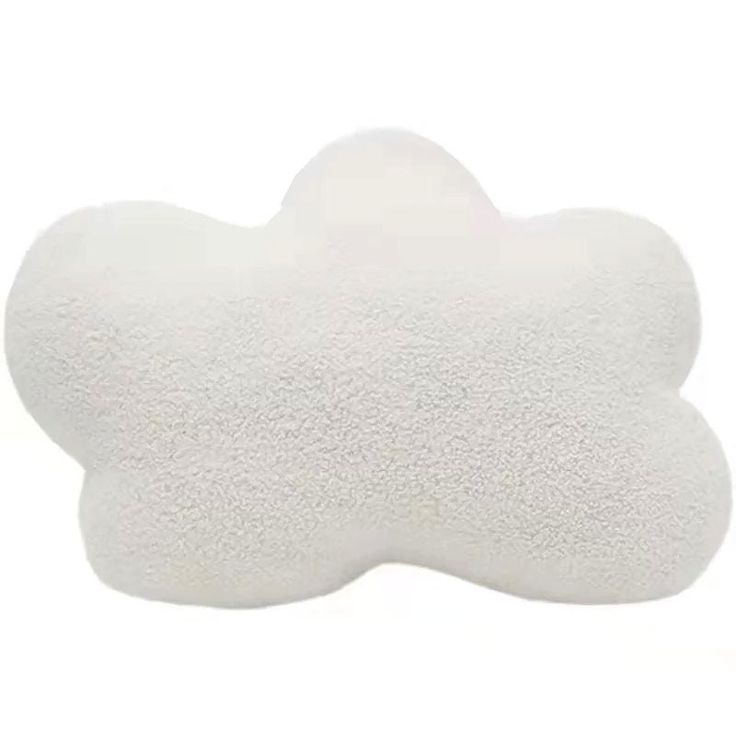 a white cloud shaped pillow on a white background