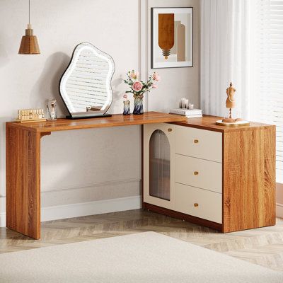 Our makeup vanity table, displaying a white drawer finishing contrasted with walnut textures, adds a touch of modernity to any room. The cabinet's innovative acrylic door design enhances its charm and elegance. This retractable dressing table is great to work as a multi-purpose desk. You can place this desk set in your bedroom as a vanity table, or place it in your office as a computer desk. Latitude Run® Color: Brown | Latitude Run® Makeup Vanity Desk, Large Vanity Dressing Table w / Reversible Makeup Vanity And Desk Combo, Makeup Vanity In Bedroom, Desk And Vanity In One, Desk With Cabinets, Vanity In Bedroom, Makeup Corner, Bedroom Vanity Desk, Mid Century Modern Vanity, Desk Vanity