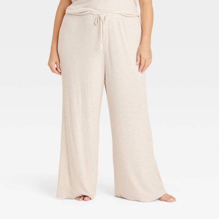 These Cozy Ribbed Wide-Leg Pants from Auden™ will keep you nice and comfy as you lounge about the house. Made from lightweight, super-cozy soft-brushed rib fabric with spandex, these mid-rise pants feature a full elastic waistband with a drawstring to help you find your perfect fit. Cut to an ankle length, they also feature wide, flared legs for a touch of chic style. Auden™: Comfort true to every shape & hue. Cozy Sleep Bottoms With Soft Texture, Cozy Soft Sleep Bottoms, Comfy Relaxed Fit Bottoms For Home, Comfy Relaxed Fit Bottoms For Relaxing At Home, Comfy Bottoms With Relaxed Fit For Home Relaxation, Cozy Super Soft Bottoms For Relaxation, Super Soft Cozy Bottoms For Relaxation, Cozy Super Soft Sleep Bottoms, Comfortable Bottoms With Elastic Waistband For Home