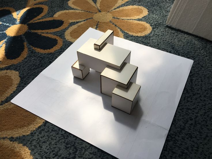 a white table sitting on top of a rug