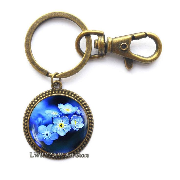 PRICES MAY VARY. Material: Alloy & Glass Cabochon ,Color:as shown Christmas Keychain,best gift to your friends,family Keychain Size: 3.5cm*2.8cm,Cabochon Diameter: 2.5cm,Base Diameter:2.5cm. 100% Brand New And High Quality.Handmade item,Packing gift bag,Everyday keychain,Fast delivery Beautiful handmade Keychain for yourself or loved one.Chirstmas Gift,photo jewelry,wedding jewelry，valentines day gifts,best friend gifts,birthday gifts,anniversary gifts,friendship gifts Material: Alloy & Glass Ca Blue Flower Charm Jewelry As Gift For Her, Round Keepsake Jewelry With Flower Charm, Blue Keychain With Key Clip For Gift, Blue Flower-shaped Jewelry With Flower Charm, Blue Round Pendant Necklace With Pressed Flowers, Glass Theme, Valentines Jewelry, Friend Birthday Gifts, Friendship Gifts