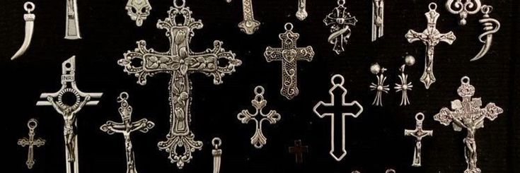 an assortment of crosses are displayed on a black background with white writing in the center