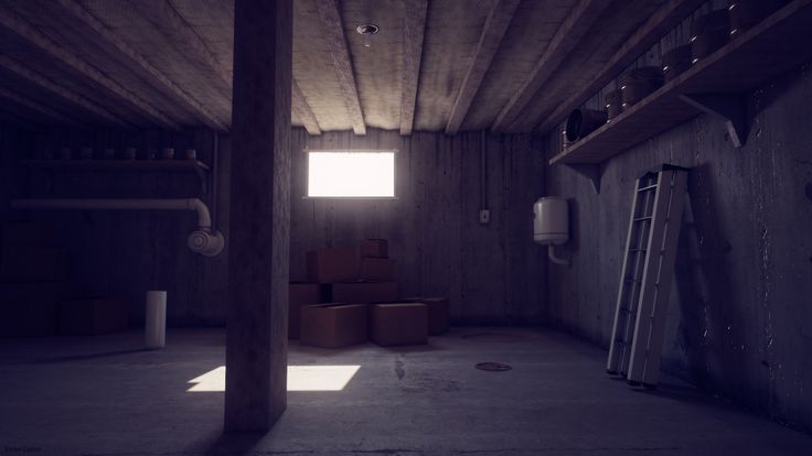 an empty room with boxes and ladders in it