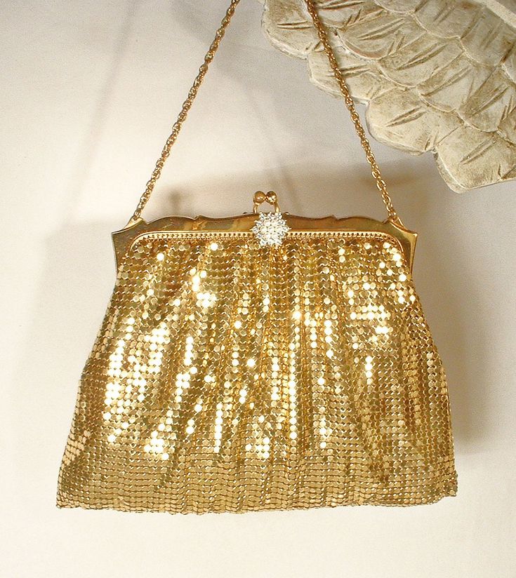 I was beyond thrilled when I found this purse Offering an absolutely stunning very high quality vintage 1940s era liquid gold mesh and crystal rhinestone, and simulated pearl Art Deco flapper evening bag/wristlet clutch purse in near PRISTINE vintage condition made by legendary designers Whiting & Davis.  This purse will be as perfect with a pair of jeans and a tee as it will with a Bridal gown. If you've ever seen one of these purses in person you know that photos are not doing it justice as th Gold Vintage Bag For Events, Vintage Handheld Evening Bag For Party, Victorian Rectangular Party Bag, Vintage Rectangular Evening Bag For Party, Vintage Evening Bag For Vintage Events, Antique Clutch Evening Bag For Vintage Events, Victorian Gold Bag For Party, Antique Style Evening Clutch Bag, Vintage Clutch Evening Bag For Events