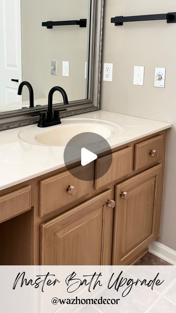 a bathroom vanity with a large mirror above it and the words master bath upgrade below