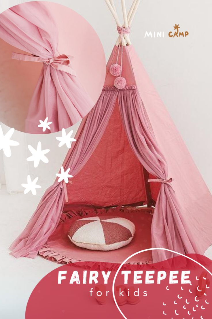 a pink teepeee tent for kids with flowers on the top and bottom half