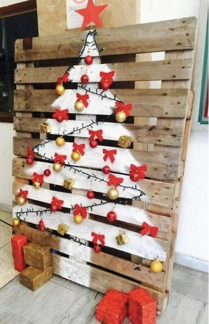 a christmas tree made out of wooden pallets