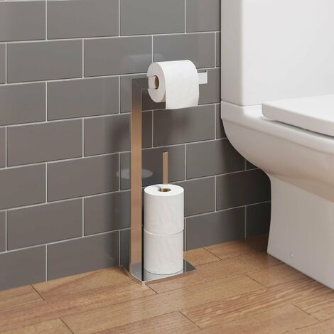 there is a roll of toilet paper next to the toilet