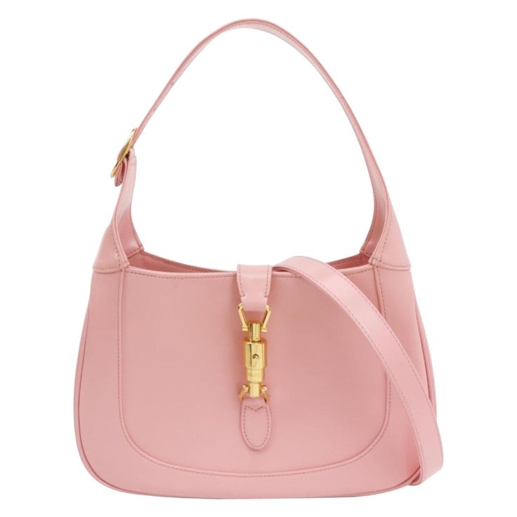 Gucci Jackie 1961 Small Leather Bag with Adjustable Strap Size Pink These are professional photos of the actual bag offered by Luxbags. The Gucci Jackie 1961 White Small bag is a modern take on an iconic design. Crafted in leather with a structured silhouette, it features a crossbody strap so you can bring your essentials wherever life takes you. Its baby blue hue is sure to add a touch of elegance to your wardrobe. CONDITION: EXCELLENT This preloved authentic bag is in excellent condition with minor signs of use throughout. Light rubbing around the corners DETAILS GUCCI Jackie 1961 Pink calfskin leather Beige suede lining Gold-tone hardware Piston lock Size Small Width: 27cm x Height: 18.5 x Depth 6cm ACCESSORY: Adjustable long shoulder strap Gucci Pink Bag, Gucci Jackie 1961, Dream Bags, Luxury Bags Collection, Gucci Purse, Small Leather Bag, Authentic Bags, Classic Flap Bag, Gucci Outfits