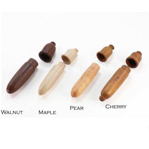 four different types of wood plugs on a white background with the words walnut, maple, maple and cherry