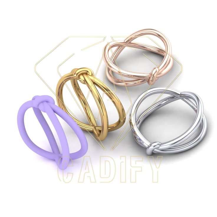 three different colored rings with the word cadfy on it's front and back sides