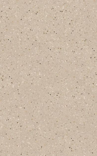 a beige background with small speckles