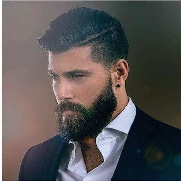 High Fade with length combed over.  Beard shaped to flatter the face.  Use REDKENMEN POLISH UP POMADE for hold and high shine.  MALCOLM'S AMETHYST OIL helps keep te beard soft and smelling great. Bart Styles, Beard Suit, Mens Hairstyles With Beard, Beard Styles Short, Beard Haircut, Long Beard, Best Beard Styles, Beard Game, Beard Growth Oil