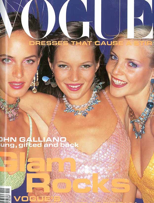 three beautiful women on the cover of a magazine