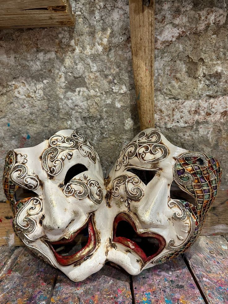 Tragi-comic ornament mask, hand-decorated in Venice with friezes, glitter and various decorations. -Made in Italy hypoallergenic and non-toxic material/resin. -Dimensions/25x30 Unisex -Shipping/worldwide We ask you to leave your email or telephone number to provide you with the shipping tracking code after purchasing. Hand Painted Masks And Prosthetics For Carnival, Artistic Masks And Prosthetics For Carnival Theater, Artistic Masks And Prosthetics For Theater And Carnival, Artistic Hand Painted Masks And Prosthetics For Carnival, Artistic Hand-painted Masks For Carnival, Artistic Masks For Mardi Gras Theater, Artistic Masks For Theater And Mardi Gras, Hand Painted Carnival Masks, Artistic White Masks For Festivals