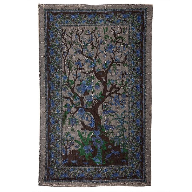 a tree with blue flowers and birds on it is hanging from the side of a wall