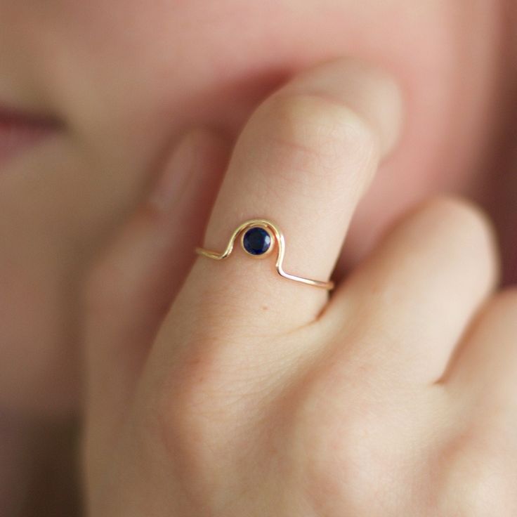 "This unique gemstone ring is the perfect addition to any stack! It is also available in every birthstone which makes it an ideal gift for any jewelry lover! The gemstones in the pictures feature a pink ruby (July birthstone) and blue sapphire (Sept birthstone). This ring is made with a 4mm gemstone and the metal options are: 14k gold filled, 14k rose gold filled, sterling silver, solid 14k yellow gold or solid 14k rose gold. You can select your preference via the drop down menu before adding it Modern Birthstone Crystal Ring For Gift, Modern Rings With Birthstone For Gifts, Modern Birthstone Rings For Gifts, Modern Crystal Ring With Round Band, Modern Open Birthstone Ring For Gift, Gemstone Open Midi Rings As Gift, Minimalist Birthstone Crystal Ring Gift, Birthstone Midi Rings As Gifts, Minimalist Gemstone Crystal Ring Gift