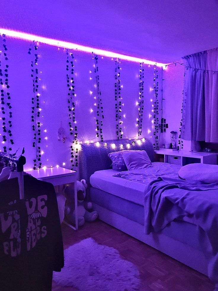 a bedroom with purple lights on the wall and bed in the center, along with white rugs