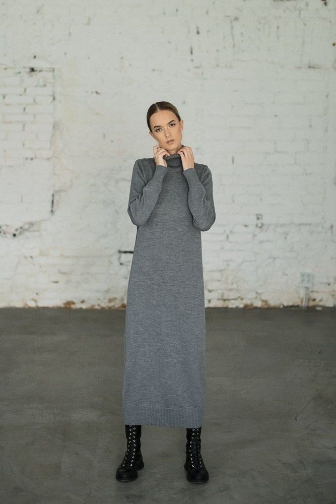 This long knitted turtle-neck dress is made of merino wool. Ruffled sleeves, ruffled bottom and straight loose type of the dress makes it super comfortable and stylish at the same time. This merino wool sweater type dress is also perfect for minimalists. MONALA Monala knitwear is handmade, each piece of garment is unique and will perfectly fit for those women who want to maintain their wardrobes minimalistic, basic and versatile. PRODUCTION The dress is made of 100% merino wool, using a manual k Long Sleeve Wool Sweater Dress For Work, Long Wool Sweater Dress For Fall, Long Wool Sweater Dress For Winter, Gray Midi-length Sweater Dress For Fall, Elegant Gray Sweater Dress For Fall, Winter Cashmere Midi Dress, Fall Wool Sweater Dress, Winter Cashmere Sweater Dress, Elegant Wool Sweater Dress For Winter