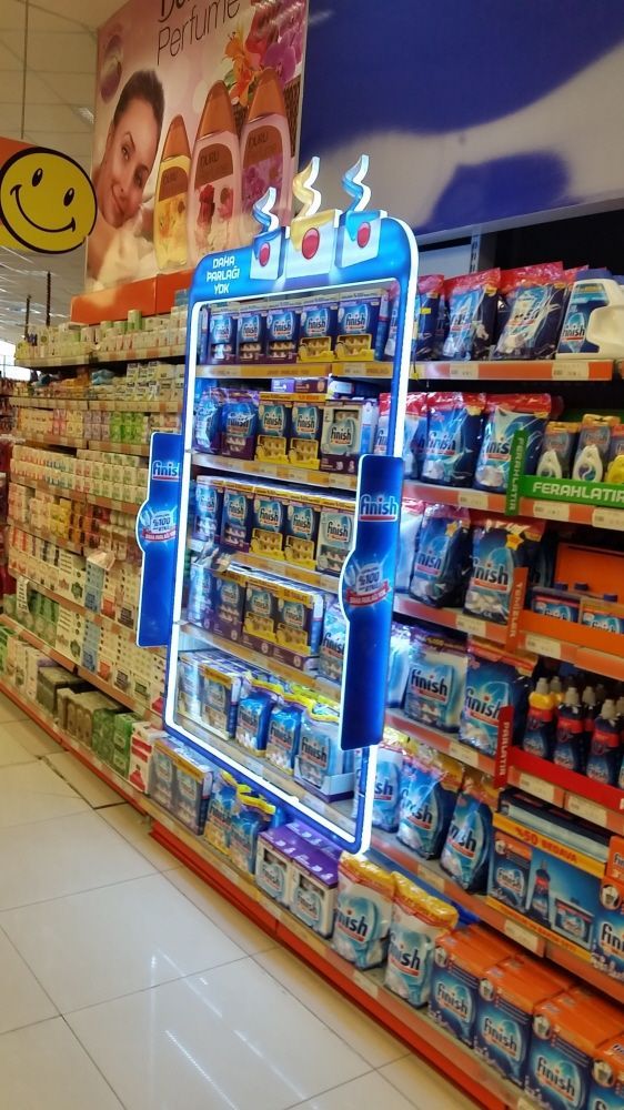 an aisle in a store filled with lots of products