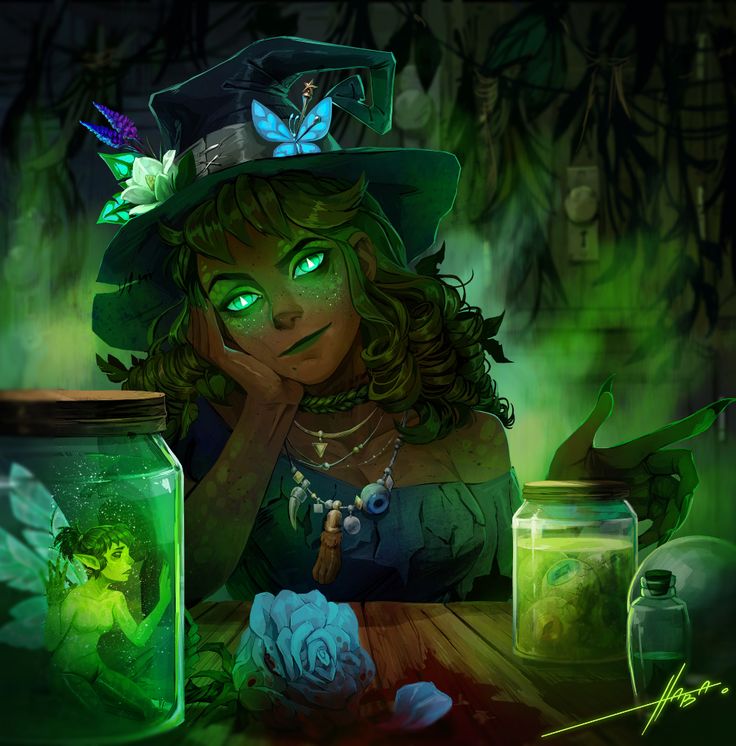 a woman in a witches hat sitting at a table next to some jars and flowers