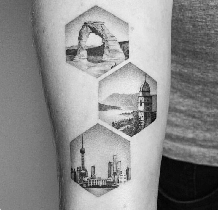 a man with a tattoo on his arm that has pictures of different cities in the shape of hexagons