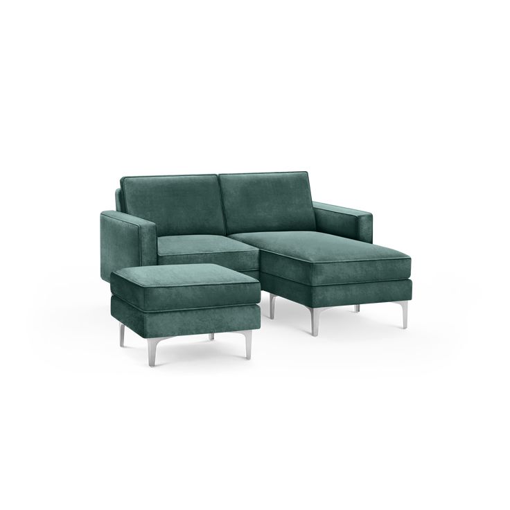 a green couch and ottoman on a white background