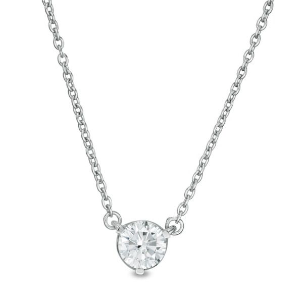 Unmatched in style, this diamond necklace from the Zales Private Collection redefines classic. Fashioned in 14K white gold, this superb choice showcases a sparkling 1/3 ct. certified colorless diamond solitaire boasting a color rank of F and clarity of I1. A signature "Z"-shaped design gleams along the setting. Polished to a bright shine, this look suspends centered along an 18.0-inch cable chain that secures with a lobster claw clasp. This piece comes with a certificate that includes a photo an Z Design, Solitaire Necklace, Diamond Solitaire Necklace, Colorless Diamond, Solitaire Necklaces, Art Deco Inspired, Diamond Stone, White Metal, Bridal Rings