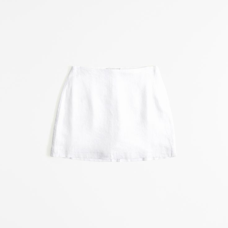 Ultra high rise mini skort in our soft linen-blend fabric, featuring a shorts lining for comfort and side zipper for a secure fit. White Summer Skort With Short Inseam, White Skort With Short Inseam For Summer, White Mini Skirt With Short Inseam For Summer, Fitted Linen Mini Skort, Linen Mini Skirt For Summer, Fitted Linen Shorts For Spring, Summer Mini Linen Skirt, Chic Fitted Linen Mini Skirt, Chic Linen Mini Skirt For Spring