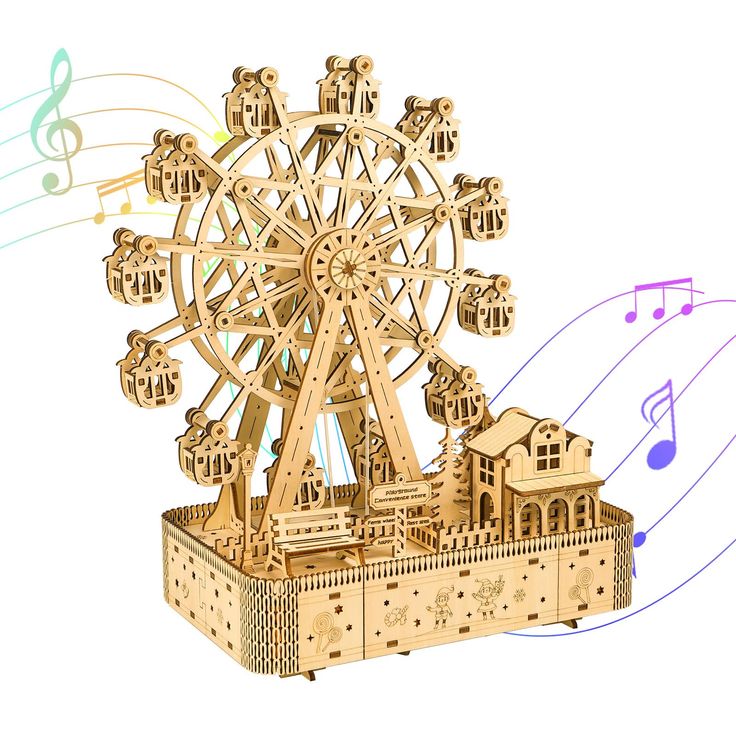 a wooden model of a ferris wheel with musical notes around it and an image of a building