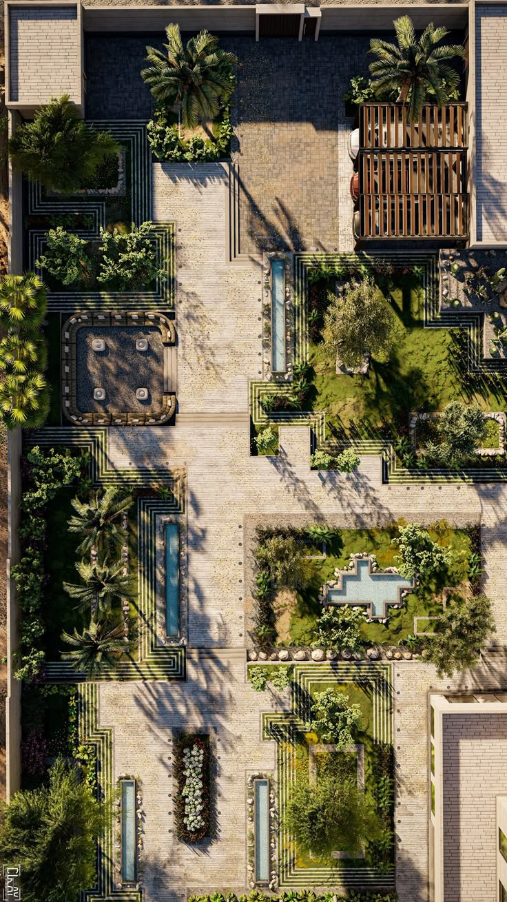 an aerial view of a courtyard with trees and plants