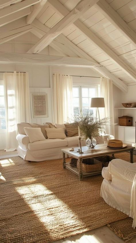 a living room filled with furniture and windows