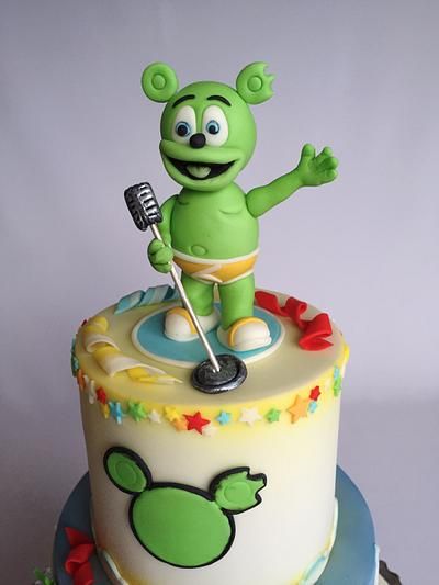 there is a cake with a green monster on top