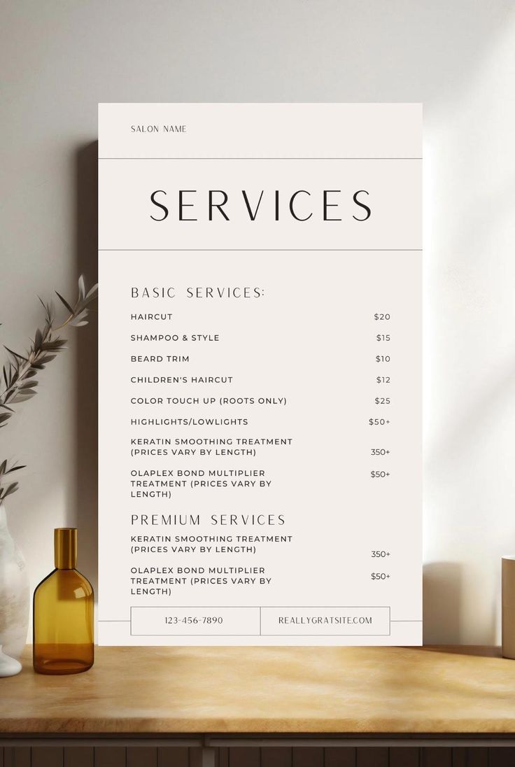 a white menu sitting on top of a wooden table next to a vase filled with flowers