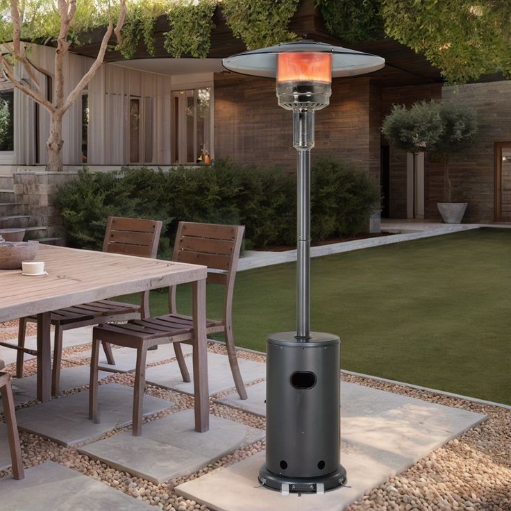 a patio heater sitting on top of a wooden table