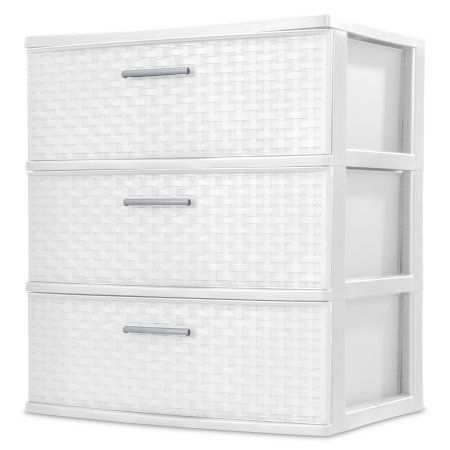 two white drawers with wicker handles on each side and one drawer open to show the bottom