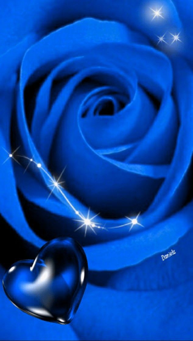 a blue rose with diamonds and a heart on the petals is shown in this image