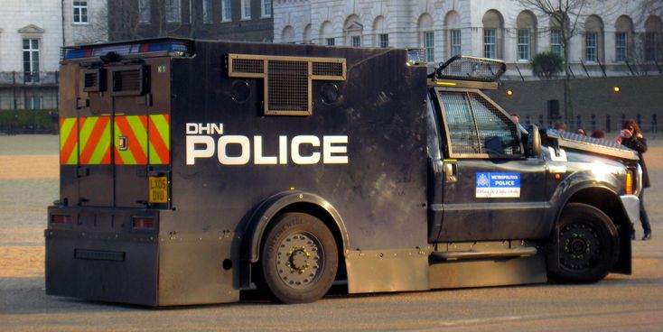 a police truck parked in front of a building