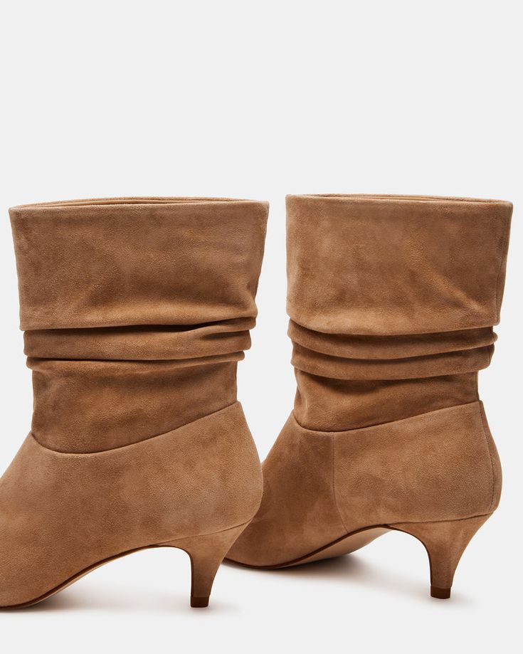 Add some sass to your step with the BRINWOOD boots . These pointed toe booties feature a trendy kitten heel and a unique scrunched shaft, making them the perfect combination of stylish and playful.  2.25 inch heel height 6.75 inch shaft circumference 13.5 inch shaft height Suede upper material Textile and synthetic lining Synthetic sock Synthetic sole Imported Chic 4-inch Heel Suede Boots, Suede Mid-calf Boots With Pointed Toe And Reinforced Heel, Brown Suede Mid-calf Boots With Pointed Toe, Suede Boots With 4-inch Heel Pointed Toe, Beige Pointed Toe Mid-calf Boots Medium Width, Kitten Heel Boots, Kitten Heels, Womens Boots, Heel Height