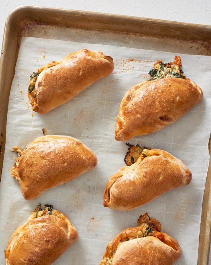 six pieces of bread on a baking sheet